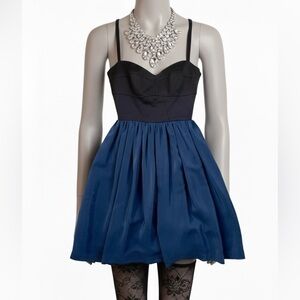 A New York Pleated Skirt Black Bustier Mini Dress